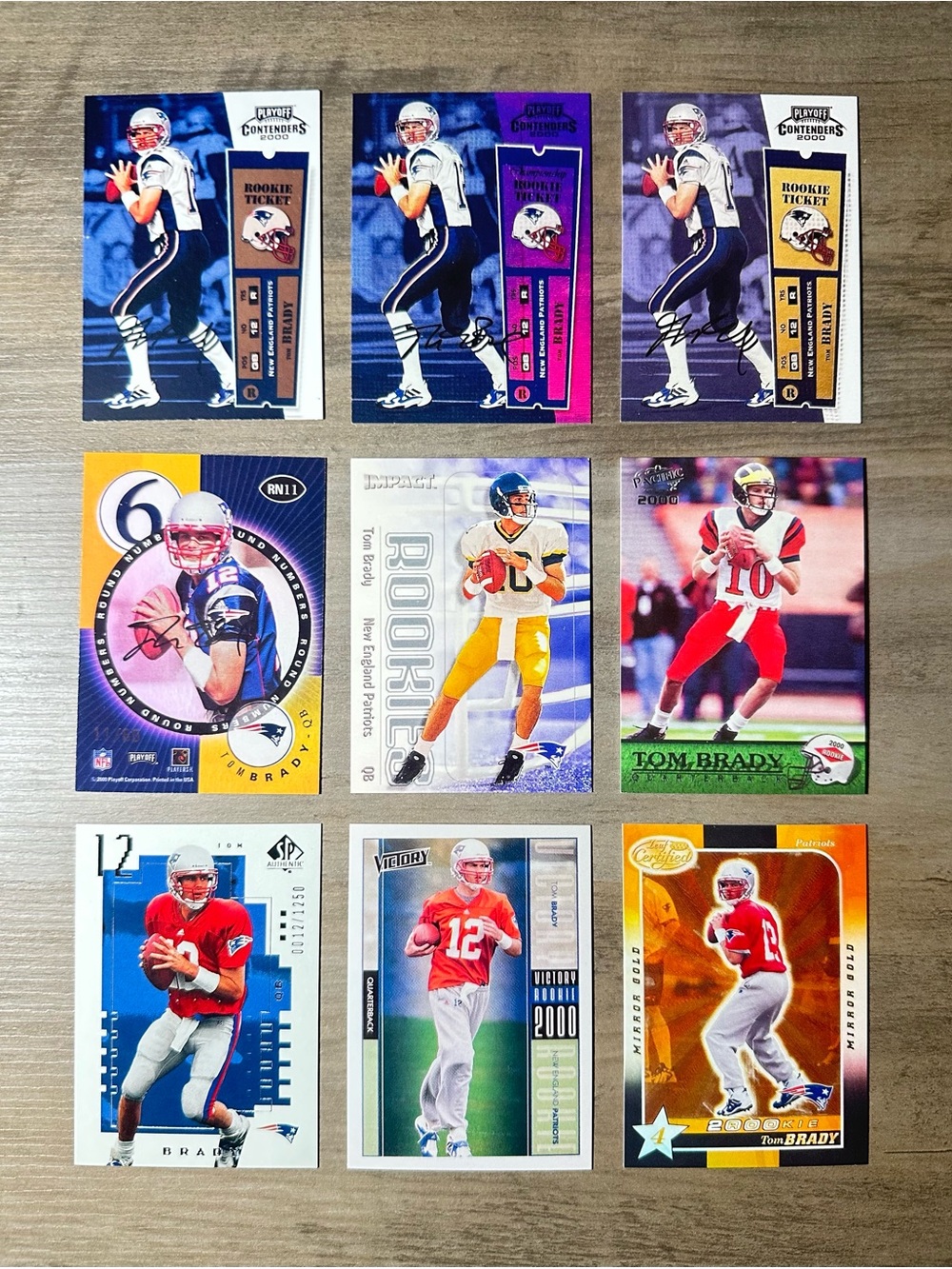 Tom Brady Signed Rookie Lot of (9) Novelty Football Cards.